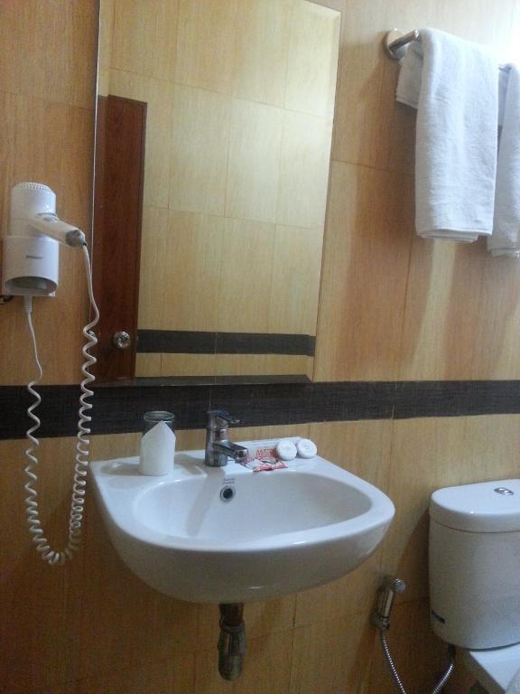 Hotel Matos Jayapura Pokoj fotografie